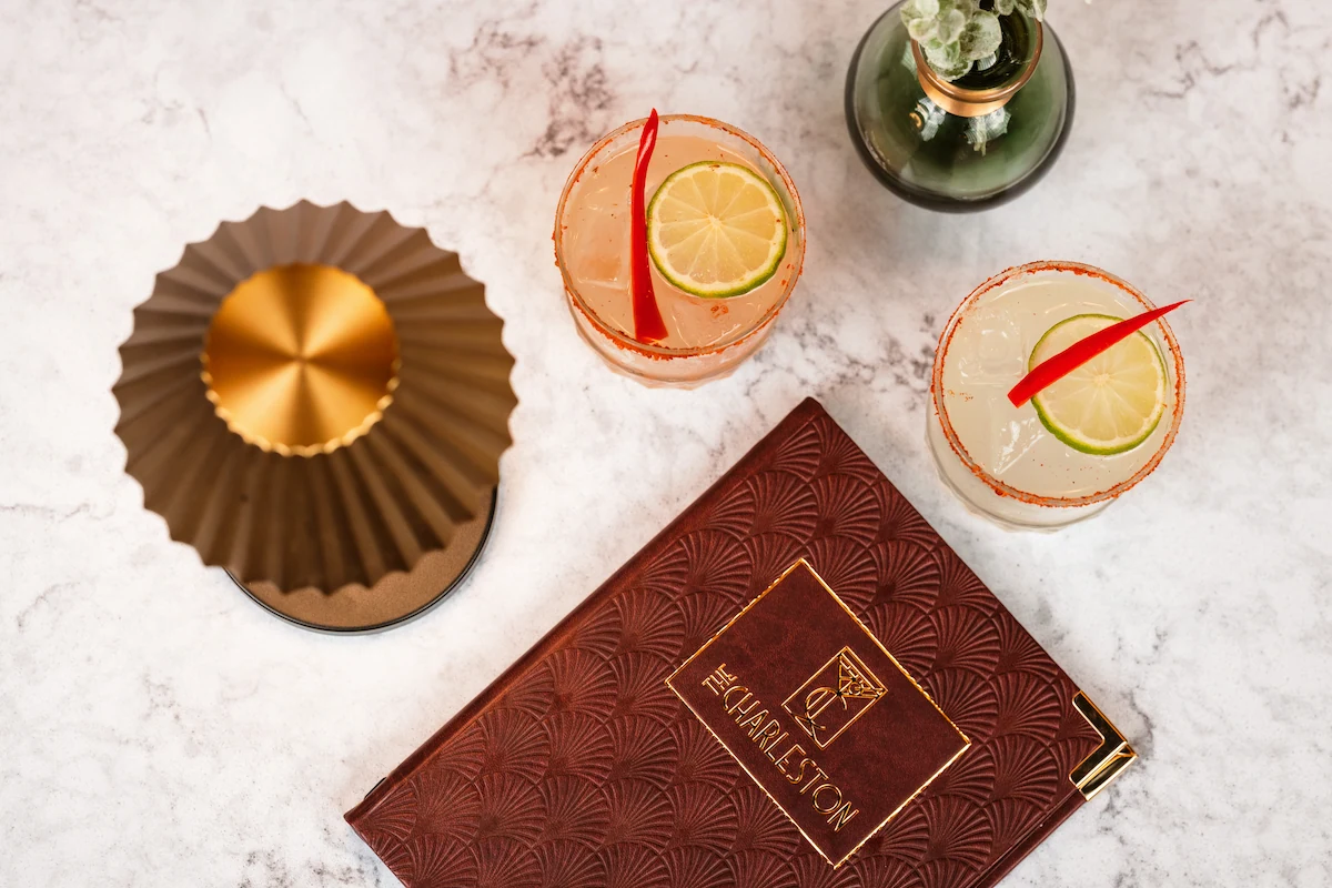 Two spicy margaritas on a table