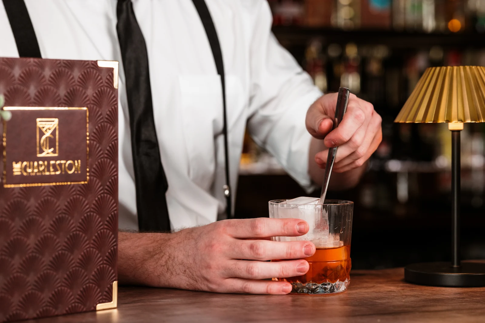Bartender making a cocktail at The Charleston