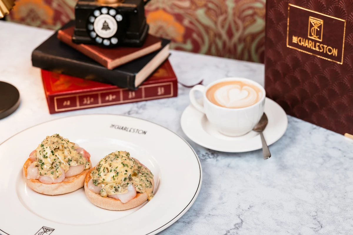 The Royal Muffin dish with a cup of coffee